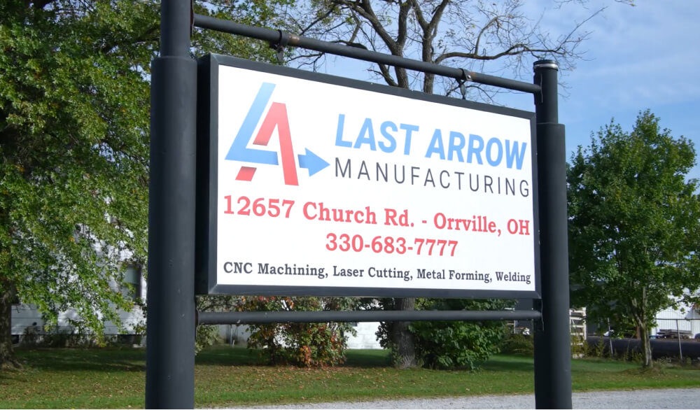 Last Arrow Manufacturing Sign