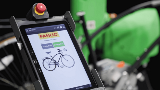 SDK Tablet for HMI Cobot with bicycle on screen