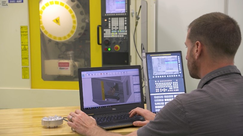 CNC Milling Software being controlled from laptop by operator