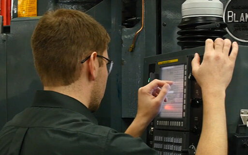 Man using CNC machine