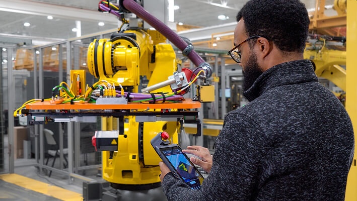 FANUC Employee with Tablet Teach Pendant