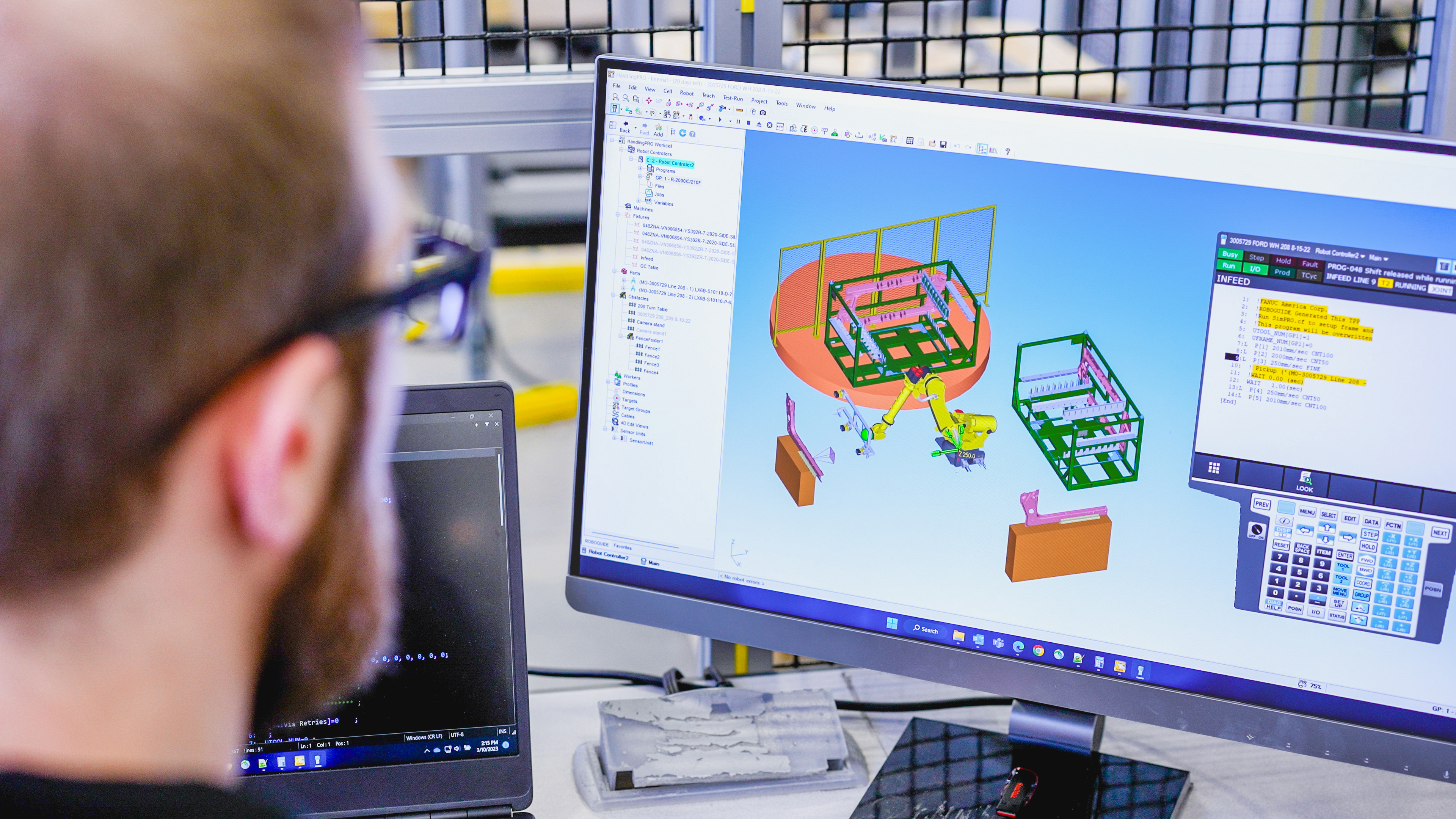 FANUC Engineer using ROBOGUIDE Close Up 1