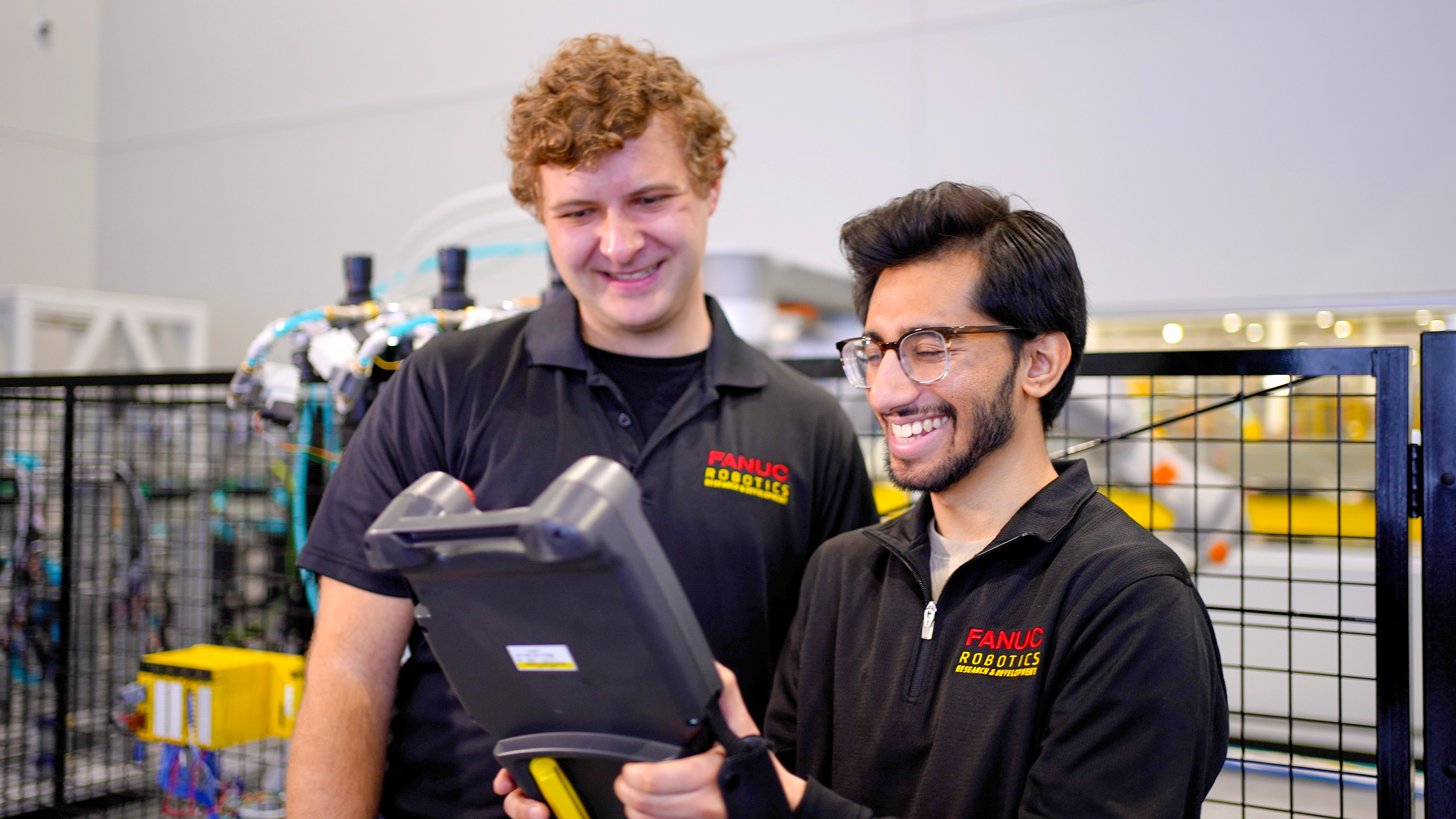 FANUC Employees Using Teach Pendant Research and Development