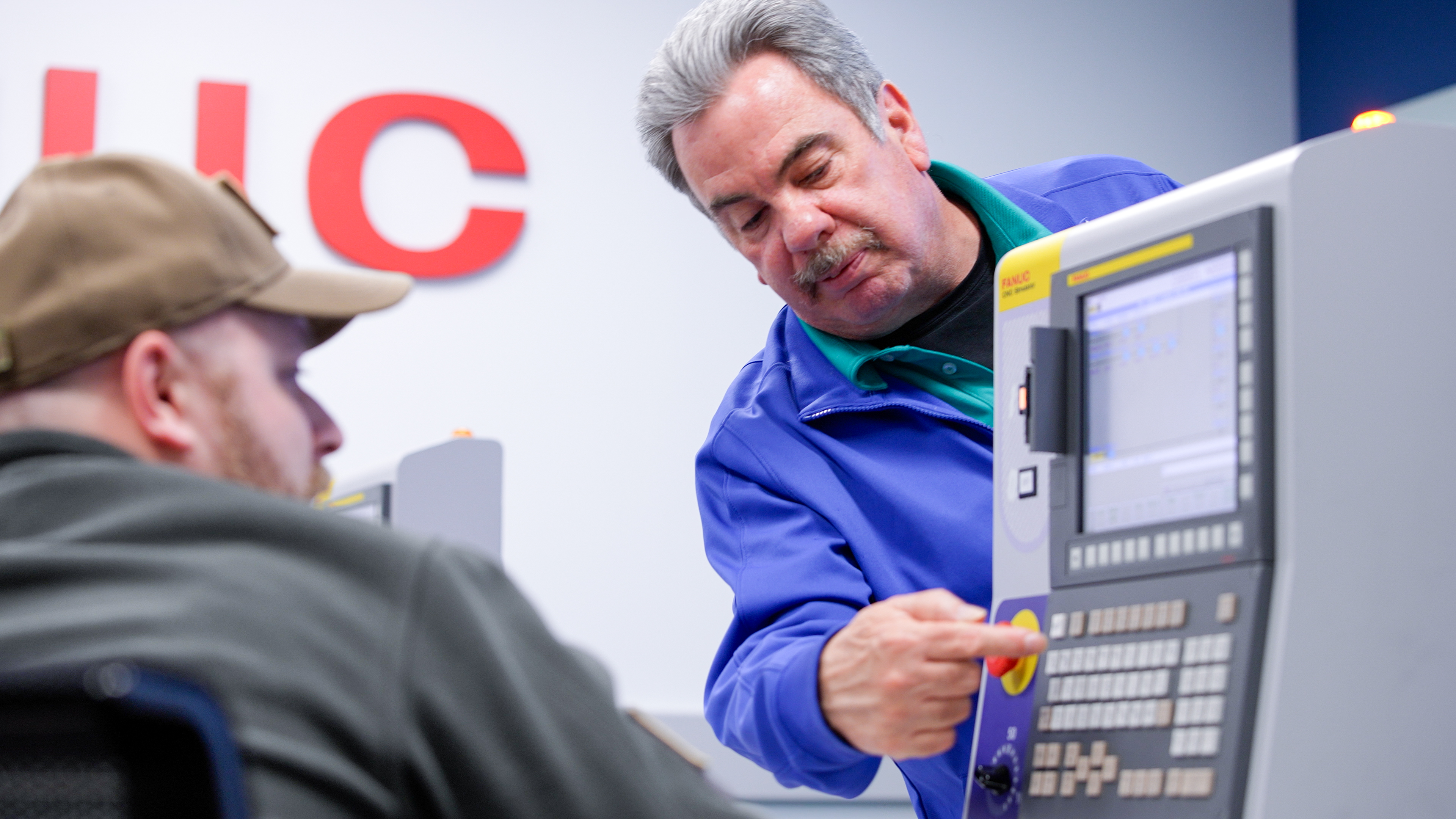 Instructor with Student CNC Simulator