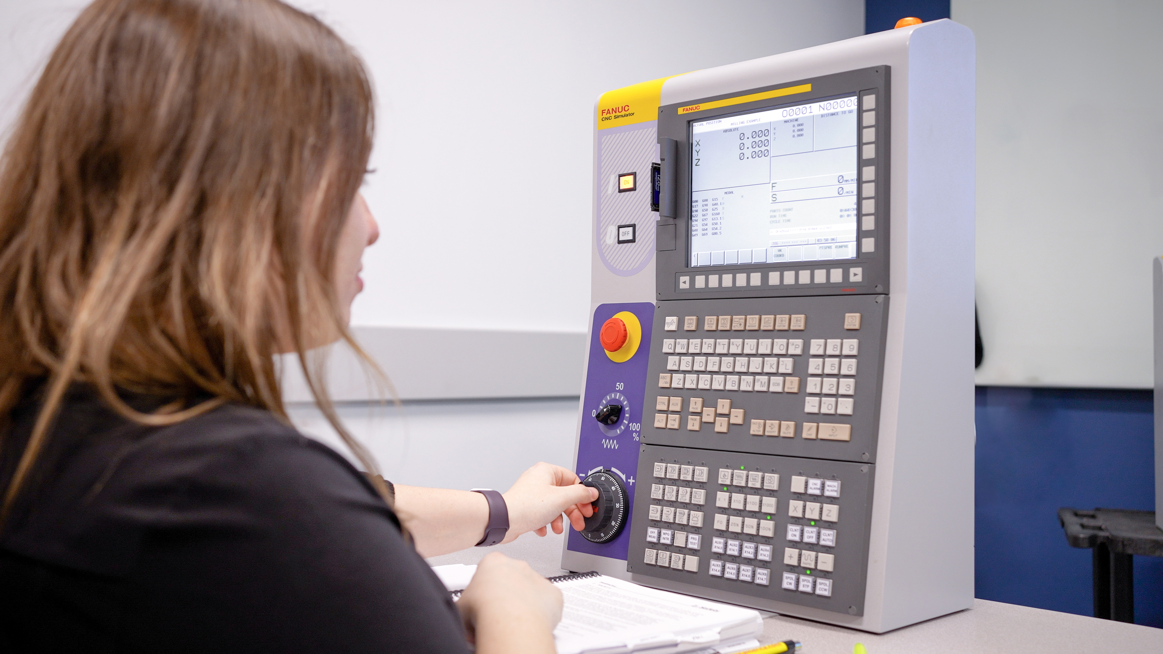 Student Working with CNC Simulator