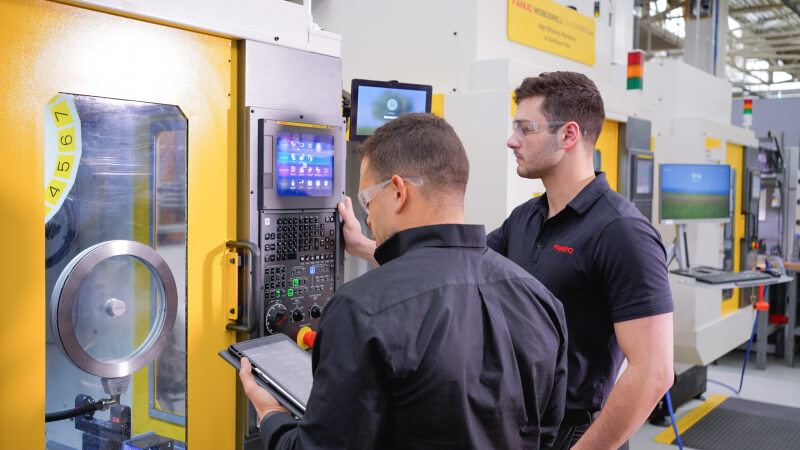 Fanuc employees with robodrill plus